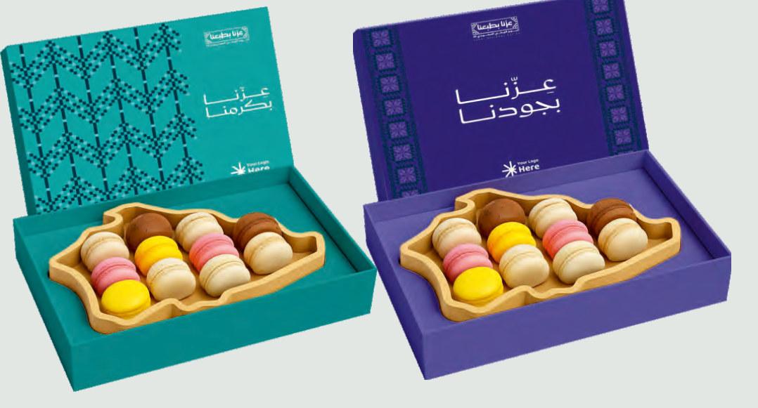 بوكسان للحلوى بلونين تركوازي وبنفسجي بنقوش اليوم الوطني